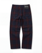 Plaid pants with a brand label on a white background
