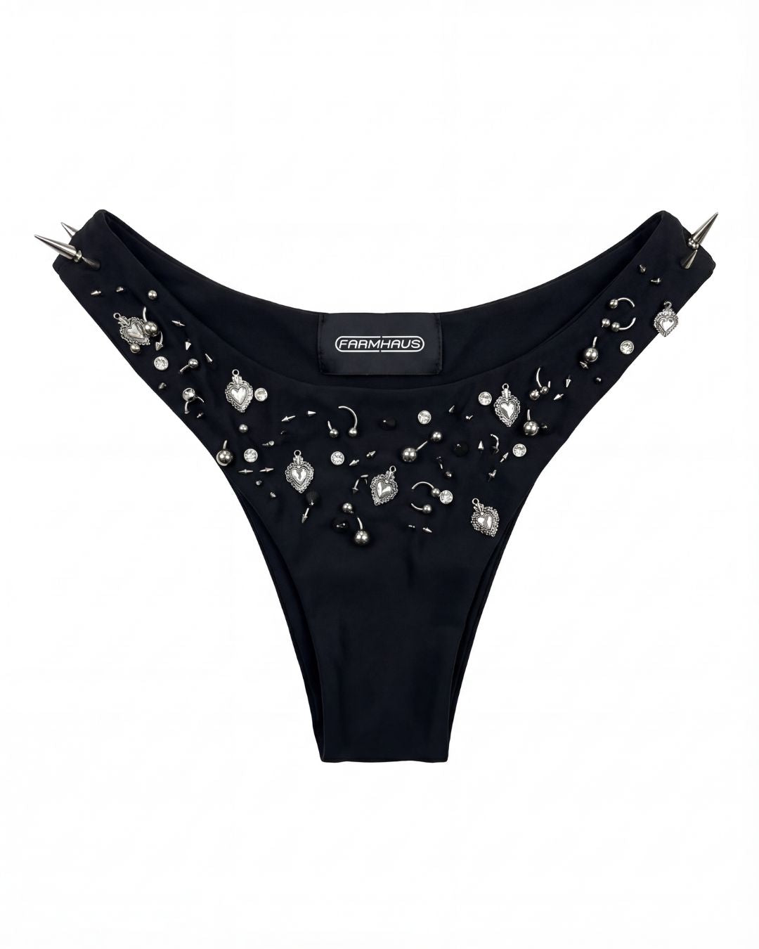 Black thong with embellishments and spikes on a white background